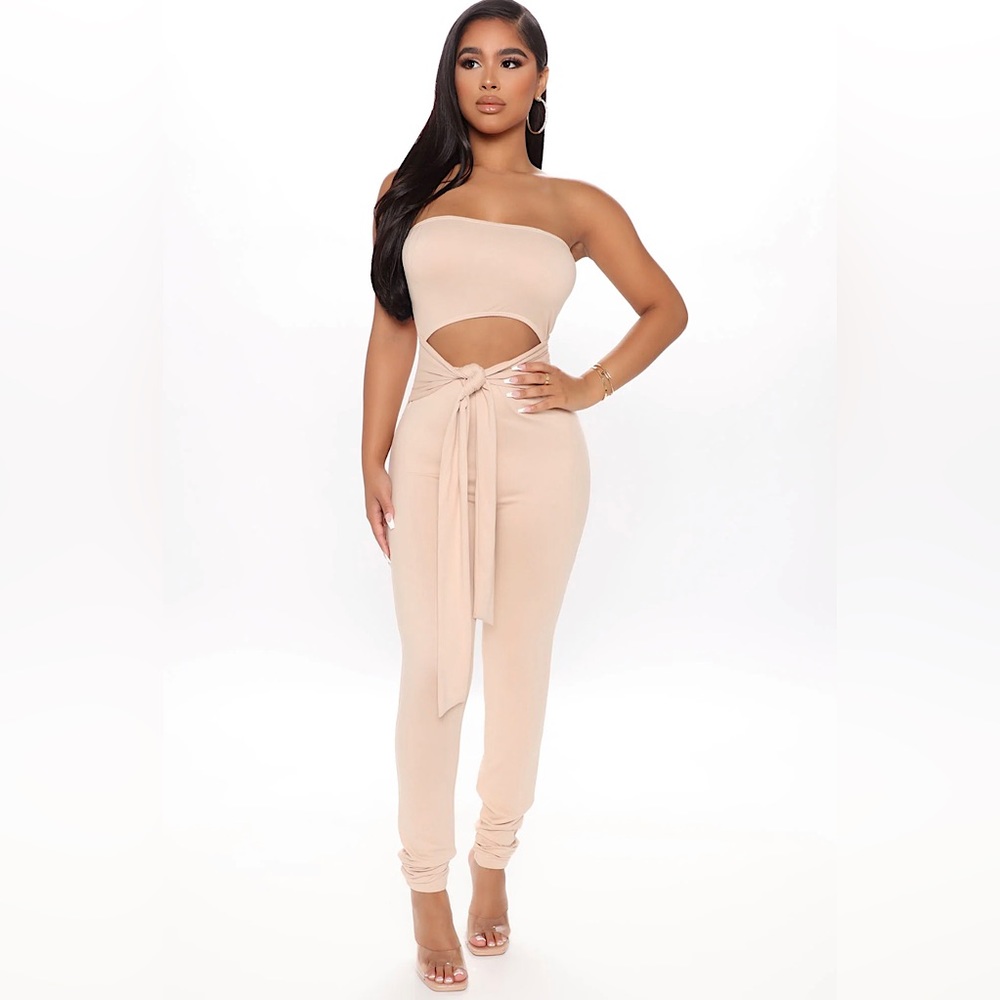 NEW with tags. Medium cut out Jumpsuit